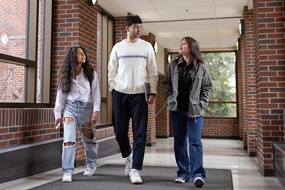 PNW students walk through campus