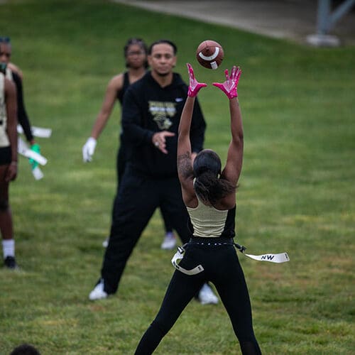 PNW's flag football team member makes a catch