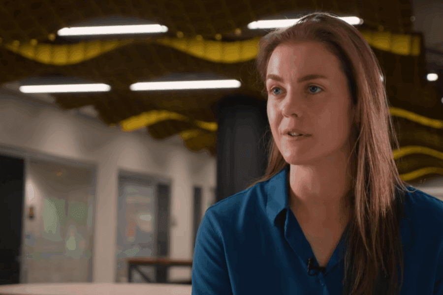 A PNW Technology Leadership and Management student sits in the Mane Zone on campus.