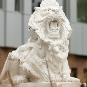 A white lion statue on the PNW Hammond Campus.