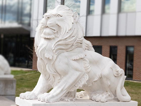 A PNW lion sculpture outdoors