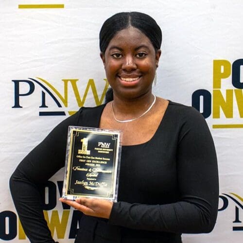 Jaelyn McDuffie with the PNW Golden Brick Award
