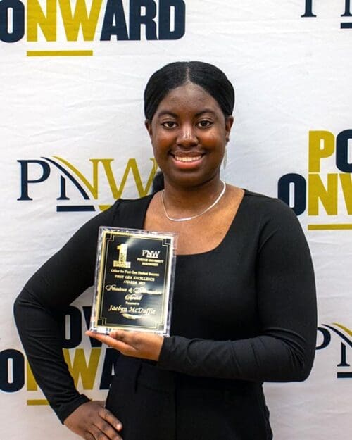 Jaelyn McDuffie with the PNW Golden Brick Award