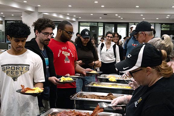 PNW students stand in line during the pancake study break.