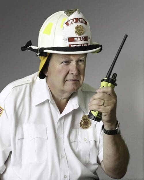 Stewart McMillan in firefighter gear.