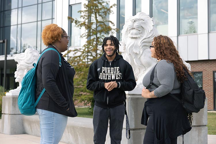 PNW students stand in front of the Nils K. Nelson Bioscience Innovation Building