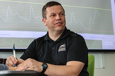 John Durocher works in a biology lab.