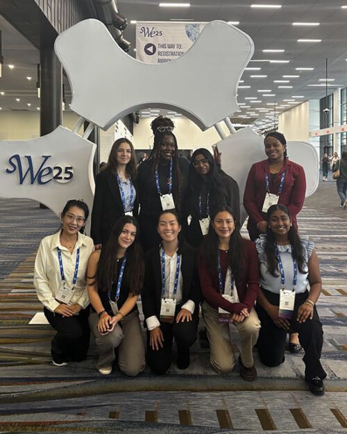 A group of students at a Society of Women Engineers event.
