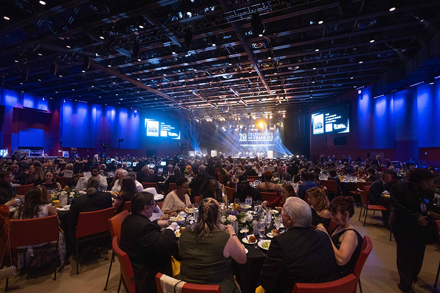 Guests sit at tables in the Hard Rock Live room.