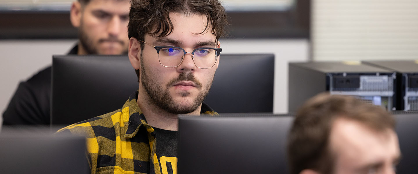 PNW students working on the computer in a computer lab