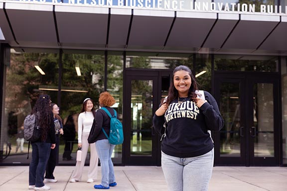 PNW students stand in front of the Nils K. Nelson Bioscience Innovation Building