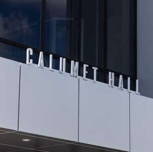 A close view of the building name on Purdue University Northwest's Calumet Hall.