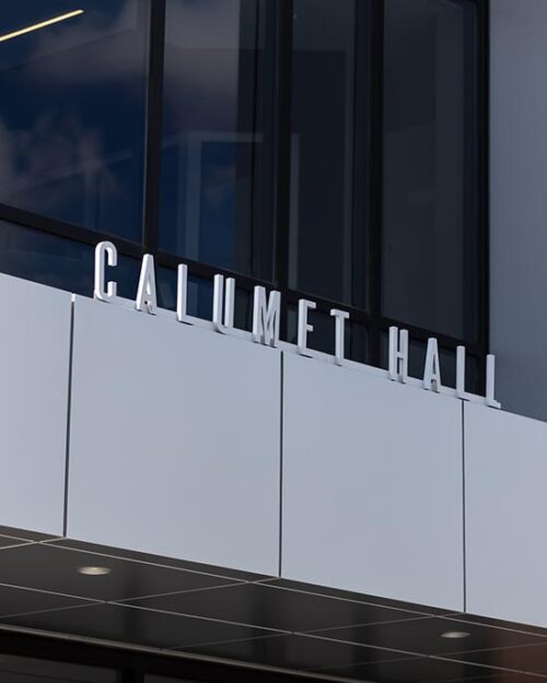 A close view of the building name on Purdue University Northwest's Calumet Hall.