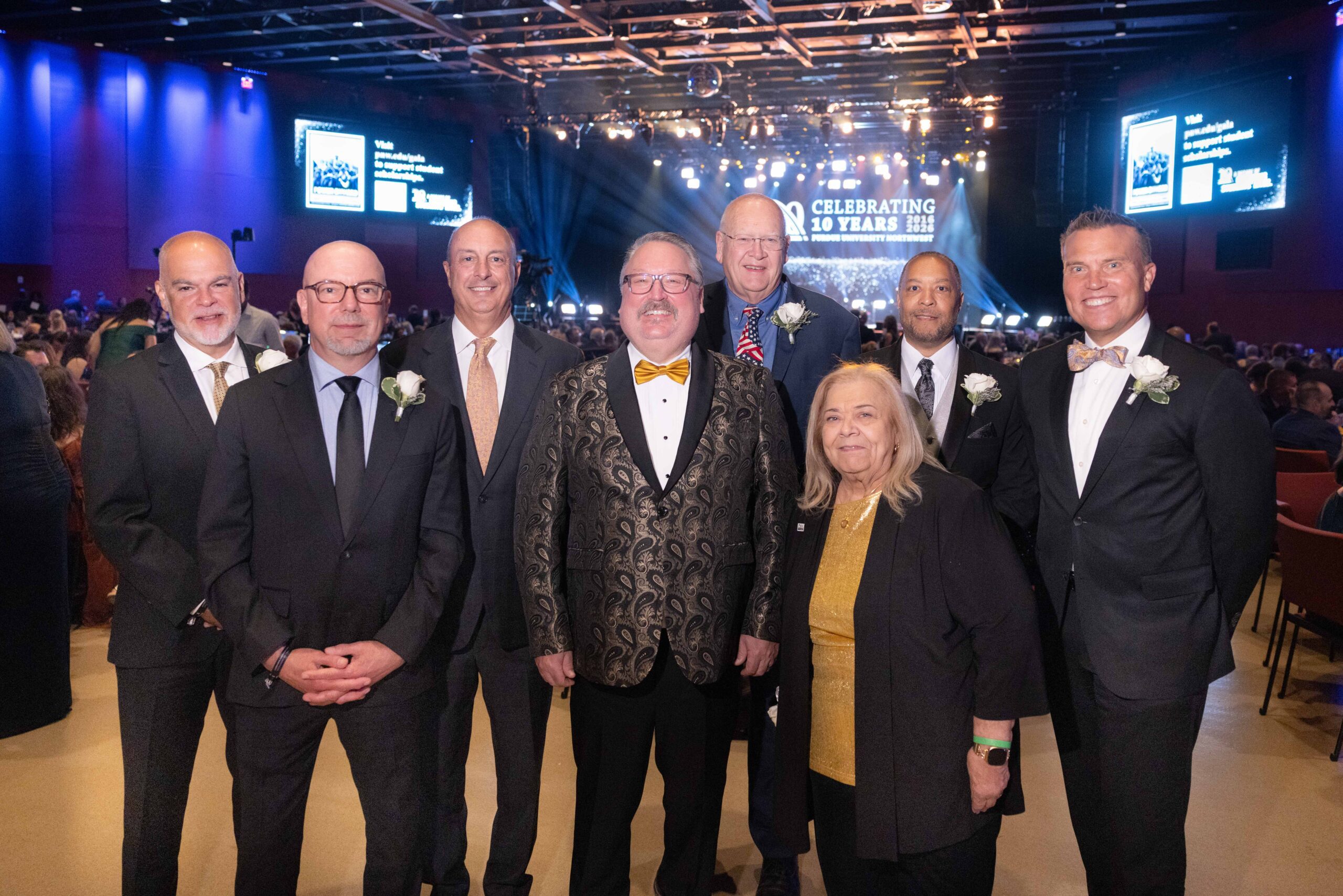 PNW Alumni Hall of Fame inductees stand with PNW Chancellor Holford